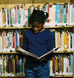 Amber School student reading a book
