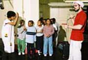 Children giving a performance in the Amber School.